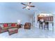 Open-concept living space with comfortable seating, a view into the kitchen and bar-top seating at 2749 Bent Leaf Dr, Valrico, FL 33594