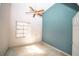 Bright bedroom with vaulted ceiling, fan, and a large window offering plenty of natural light at 2910 Pine Club Dr, Plant City, FL 33566