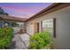 Inviting front entrance with covered walkway and well-maintained landscaping for a charming curb appeal at 3147 Mission Grove Dr # 3147, Palm Harbor, FL 34684