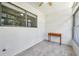 Cozy sunroom with tiled floors, offering a tranquil space with natural light at 3147 Mission Grove Dr # 3147, Palm Harbor, FL 34684