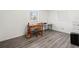 Bedroom setup as an office with a desk and chair, and a large window at 3210 Acacia St, Lutz, FL 33558