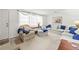 Cozy living room setup with comfortable seating, side table, and neutral color scheme at 3210 Acacia St, Lutz, FL 33558