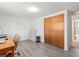 Functional office space with vinyl floors, natural light, and a closet for storage at 3210 Acacia St, Lutz, FL 33558