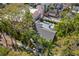 Aerial view of a home with a large backyard pool, lush landscaping, and palm trees at 346 16Th Ne Ave, St Petersburg, FL 33704