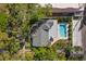 Aerial view of a home featuring a backyard pool and mature landscaping at 346 16Th Ne Ave, St Petersburg, FL 33704