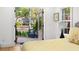 Bright bedroom featuring backyard view through open french doors at 346 16Th Ne Ave, St Petersburg, FL 33704