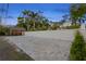 Long and paved driveway leading up to a lush garden, offering privacy and ample space at 346 16Th Ne Ave, St Petersburg, FL 33704