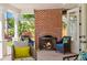 Outdoor patio features a brick fireplace and comfortable seating area at 346 16Th Ne Ave, St Petersburg, FL 33704