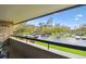 Scenic balcony view overlooks parking and greenery at 36750 Us 19 N # 19212, Palm Harbor, FL 34684