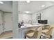 Efficient kitchenette with a breakfast bar offering casual dining, modern appliances, and ample storage at 36750 Us 19 N # 19212, Palm Harbor, FL 34684
