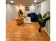 Bright living room showcases hardwood floors and comfortable seating arrangements at 3704 Haven Dr, New Port Richey, FL 34652