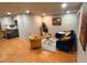 Spacious living area with wood flooring and views to the modern kitchen at 3704 Haven Dr, New Port Richey, FL 34652