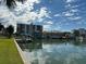 Beautiful waterfront property with private docks, offering stunning views of the canal and cityscape at 430 Larboard Way # 3, Clearwater Beach, FL 33767