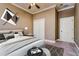 Stylishly furnished bedroom with modern decor and a ceiling fan at 4605 W Vasconia St, Tampa, FL 33629