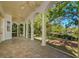 An elegant covered patio with beautiful lake views at 4605 W Vasconia St, Tampa, FL 33629