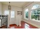 Hallway with a view of the lush, mature landscape at 4605 W Vasconia St, Tampa, FL 33629