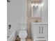 Bright bathroom featuring tile walls, a modern vanity, and updated fixtures at 4720 50Th N Ave, St Petersburg, FL 33714