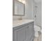 Clean bathroom with a vanity, mirror, and a tiled shower at 4720 50Th N Ave, St Petersburg, FL 33714