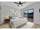 Serene bedroom with a sliding glass door and view of the pool, plenty of natural light at 4720 50Th N Ave, St Petersburg, FL 33714
