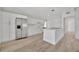 Kitchen boasts stainless appliances, breakfast bar, and an open concept living area at 4720 50Th N Ave, St Petersburg, FL 33714