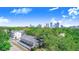 A birds eye view of the property and the Tampa skyline in the distance at 506 S Willow Ave # 7, Tampa, FL 33606