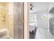 Bathroom and a partial view of the bedroom at 506 S Willow Ave # 7, Tampa, FL 33606