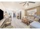 Spacious living area with a modern design, featuring sleek furniture, open floor plan, and lots of natural light at 506 S Willow Ave # 7, Tampa, FL 33606