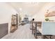 Open-concept living and dining area with stylish furnishings, contemporary decor, and beautiful flooring at 506 S Willow Ave # 7, Tampa, FL 33606