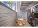Cozy outdoor patio with a small table and chairs, perfect for relaxing and enjoying the fresh air at 506 S Willow Ave # 7, Tampa, FL 33606
