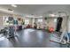 Large gym space featuring various workout machines, exercise equipment, and open floor for activities at 5101 Coquina Key Se Dr # A, St Petersburg, FL 33705