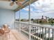 Waterfront views from the balcony create a serene outdoor retreat with ample seating at 545 Pinellas Bayway S # 108, St Petersburg, FL 33715