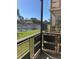 Relaxing screened balcony overlooking a peaceful pond and lush landscaping at 6070 80Th N St # 109, St Petersburg, FL 33709