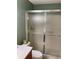 Bathroom featuring a vanity and a glass shower door at 6070 80Th N St # 109, St Petersburg, FL 33709