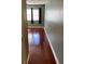 Bedroom with wood flooring and window at 6070 80Th N St # 109, St Petersburg, FL 33709