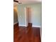 Comfortable bedroom featuring hardwood floors and a closet at 6070 80Th N St # 109, St Petersburg, FL 33709
