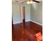 Cozy bedroom with hardwood floors and a convenient closet at 6070 80Th N St # 109, St Petersburg, FL 33709