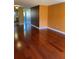 Bright living room with hardwood floors and stylish color scheme at 6070 80Th N St # 109, St Petersburg, FL 33709