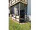 Enclosed patio with sliding glass door showing its integration with the outdoors at 6070 80Th N St # 109, St Petersburg, FL 33709