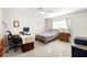 Bright bedroom with natural light, ceiling fan, and neutral decor at 6100 Gulfport S Blvd # 414, Gulfport, FL 33707