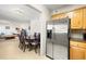 Modern kitchen seamlessly flows into dining area creating an inviting space for cooking, dining, and entertaining at 6100 Gulfport S Blvd # 414, Gulfport, FL 33707