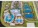 Aerial view of community amenities including the pool, tennis courts, playground, and clubhouse at 6217 Golden Beach Dr, Apollo Beach, FL 33572
