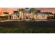 Community clubhouse with ample parking at sunset at 6217 Golden Beach Dr, Apollo Beach, FL 33572