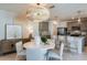 Bright dining room features a round table, stylish chairs, and a unique pendant light fixture at 6217 Golden Beach Dr, Apollo Beach, FL 33572