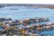 An aerial view showcases a waterfront community with easy ocean access at 720 Capri Blvd, Treasure Island, FL 33706