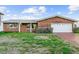 Charming brick home exterior with a two car garage at 720 Capri Blvd, Treasure Island, FL 33706