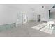 Spacious room with sliding doors, offering lots of natural light and potential for renovation at 720 Capri Blvd, Treasure Island, FL 33706