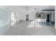 Spacious room with sliding doors, offering lots of natural light and potential for renovation at 720 Capri Blvd, Treasure Island, FL 33706