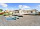 Inviting backyard pool, perfect for a refreshing dip in the water at 720 Capri Blvd, Treasure Island, FL 33706