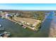 An aerial view of a waterfront lot ready for construction at 8437 Indies Dr, Hudson, FL 34667