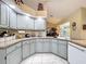 Well-appointed kitchen features light-colored cabinets and modern appliances at 8437 Indies Dr, Hudson, FL 34667